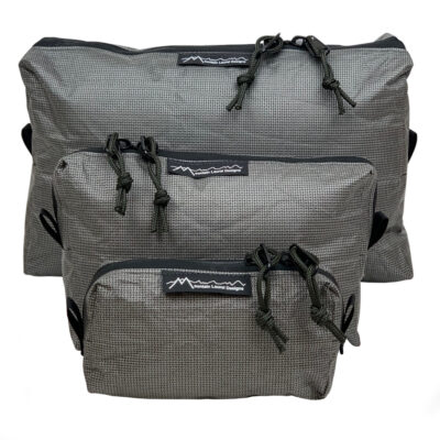 A front view of the MLD UltraX 100 Packing Cubes: Small, Medium, and Large.